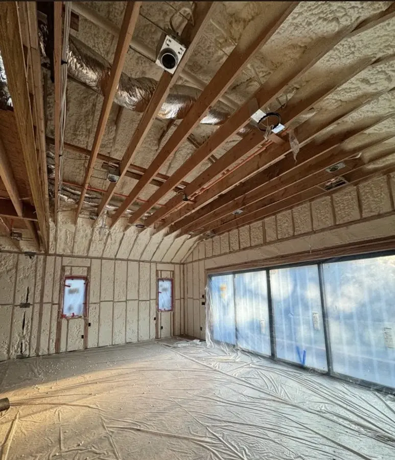 Interior walls and ceiling insulated with spray foam during new construction in Spartanburg